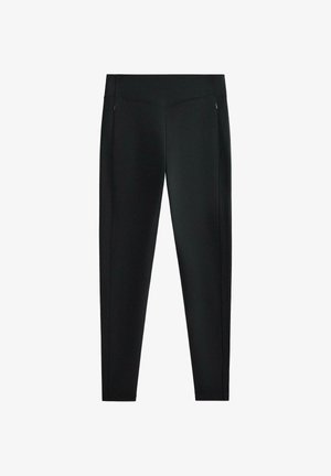 Črne legice so izdelane iz gladkega materiala z oprijetim krojem, stranskimi žepi na zadrgo in minimalističnim dizajnom. Ojačane šive ob šivih.