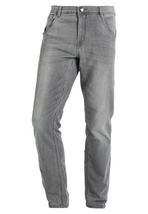 Grijze spijkerbroek met een rechte pasvorm, vijf zakken en een knoopsluiting. De stof heeft een subtiele vervaagde textuur en traditionele stiksels.