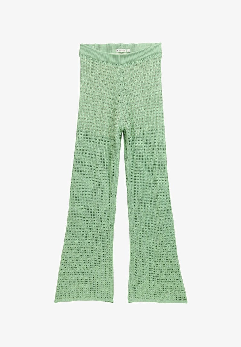 Zielone, dziane spodnie dzwony z teksturowanym wzorem i szerokim pasem w talii. Tkanina ma otwartą strukturę i stopniowe przejście kolorów.