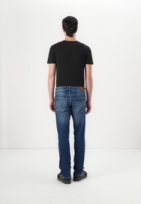 Tommy Jeans SCANTON  - Jeans Slim Fit - denim dark