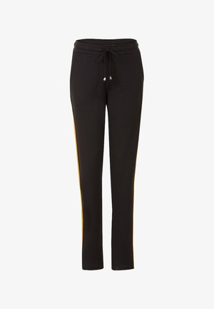 Pantalon de survêtement noir à coupe droite avec taille élastique et cordon, avec une fine bande jaune le long de la couture extérieure.