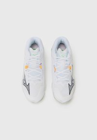 White athletic sneakers with mesh and synthetic upper, black and green accents, textured soles, and orange eyelet detailing.