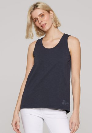 Navy blue sleeveless tank top made of soft, lightweight fabric. Features a rounded neckline and a relaxed fit, with a logo accent at the hem.