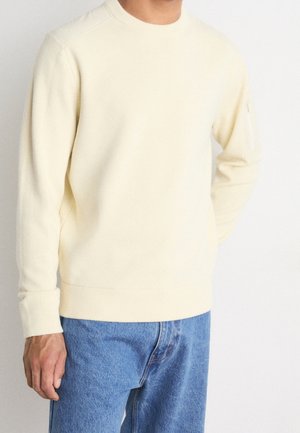 Stickad tröja - off-white