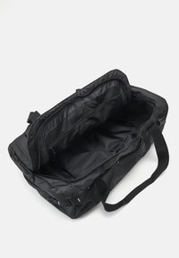 The North Face BASE CAMP VOYAGER DUFFEL 62L UNISEX - Sportinis krepšys - black/white