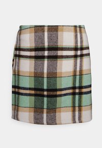 Ruiten mini-jurk met een mix van groen, wit, beige en zwart in een geweven textuur met een rechte vorm en een zoomlijn.