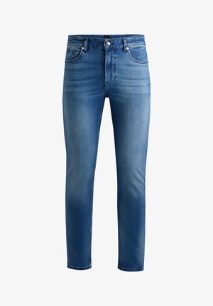 Blue denim jeans with a slim fit, featuring five pockets, a zip fly, and subtle fading on the front. Smooth texture and straight legs.