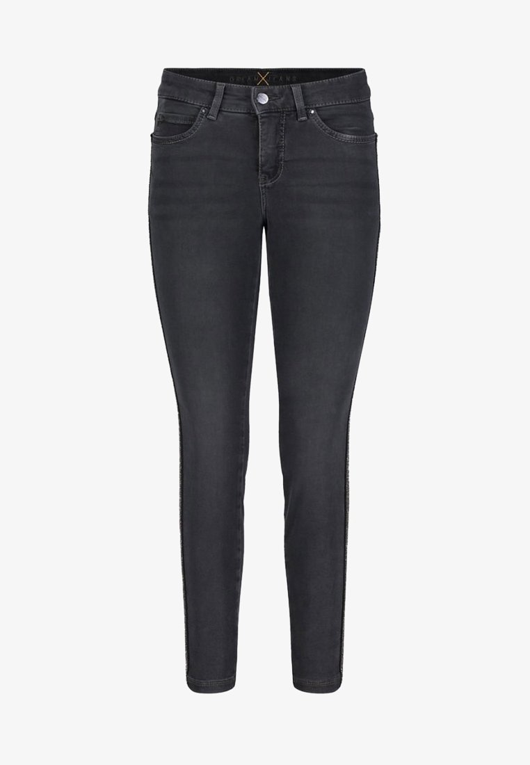 Vaqueros skinny negros de denim, con una cintura de altura media, cinco bolsillos, costuras sutiles y un cierre clásico de botón y cremallera.