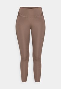 Legginguri atletice maro, realizate dintr-un material neted și elastic, cu un talie înaltă. Au un logo mic negru pe partea inferioară a piciorului stâng.