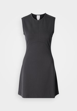 Sleeveless black dress made of smooth fabric, featuring a high neckline, a front zipper, and a fitted bodice with flared hem.