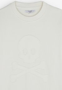 Helle Sweatshirt aus Baumwolle mit einem gestickten Skull-und-Knochen-Motiv in der Mitte. Rundhalsausschnitt und gerippte Bündchen.