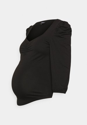 Camisa de maternidade preta com decote em V, mangas bufantes até ao cotovelo e detalhe franzido na frente, feita de um tecido suave e elástico.