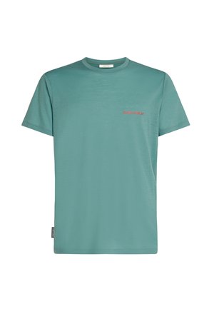 T-shirt verde menta a maniche corte realizzato in tessuto morbido, con una texture sottile e un piccolo logo rosso "icebreaker" sul petto.