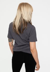 Gray cotton t-shirt with short sleeves, a relaxed fit, and a smooth texture, shown from the back against a plain white background.