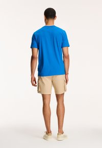 Shiwi Triko s potiskem - skydive blue