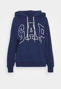 Sudadera navy de material de mezcla de algodón, con un gran logo blanco de "GAP", capucha con cordón y puños y dobladillo de canalé.