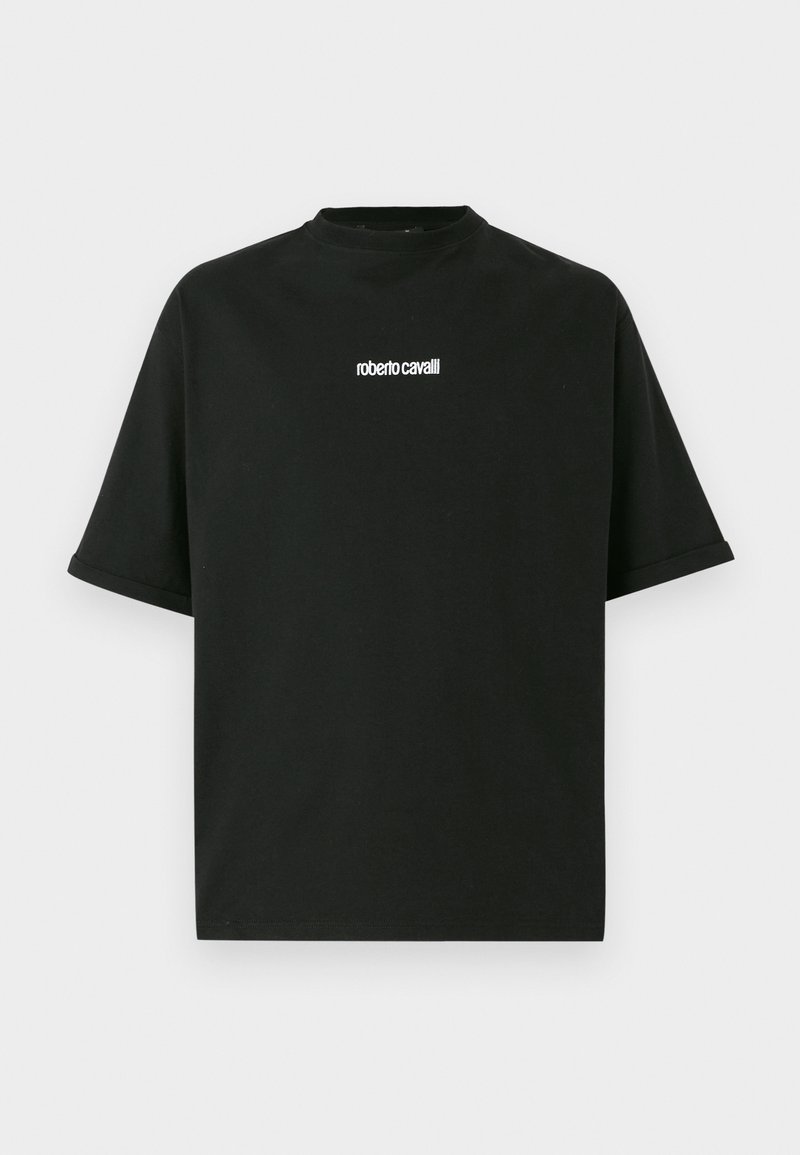 T-shirt noir à manches courtes oversized avec le logo blanc "roberto cavalli" centré sur la poitrine, col ras du cou et ourlets de manches retroussés.