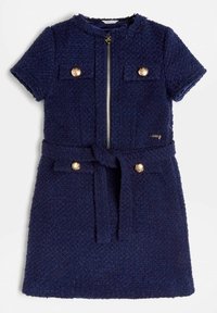 Vestido de manga corta texturizado en azul marino con cremallera, dos bolsillos frontales, botones dorados y un cinturón en la cintura.