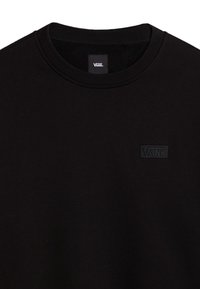Sweat-shirt noir à col rond, en tissu doux. Présente un patch logo rectangulaire Vans noir sur le devant.