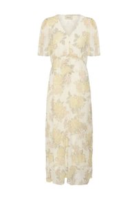 Robe longue couleur crème avec manches courtes, col en V et motif floral jaune sur tout le tissu.