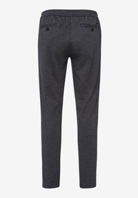 Dark gray textured pants with elastic waistband and two buttoned back pockets, shown from the rear.