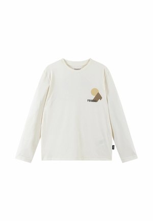 Kremowa koszula z długim rękawem i okrągłym dekoltem, z małym beżowo-brązowym geometrycznym logo i napisem "reima" na piersi.