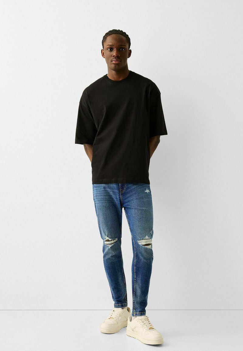 Bershka Slim fit jeans blauw denim/bluedenim Bershka Slim fit jeans blauw denim/bluedenim