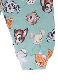 Katoenen joggingsbroeken in mintgroen met verschillende cartoon dierengezichten, waaronder honden, katten en een hert, met ribbenboorden en gedetailleerde illustraties.