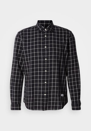 Chemise noire à manches longues avec motif à carreaux blancs, col boutonné et fermeture à boutons sur le devant ; possède une petite étiquette sur le côté inférieur.