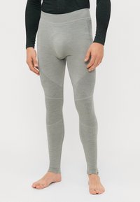 Leggings térmicos cinzentos com padrão texturizado, design ajustado, cintura elástica e bainhas com punhos, adequados para vestuário ativo.