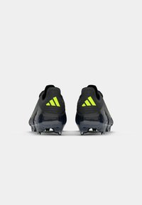 adidas Performance F50 ELITE FG - Chaussures de football pour terrain sec - core black/iron metallic/lucid lemon