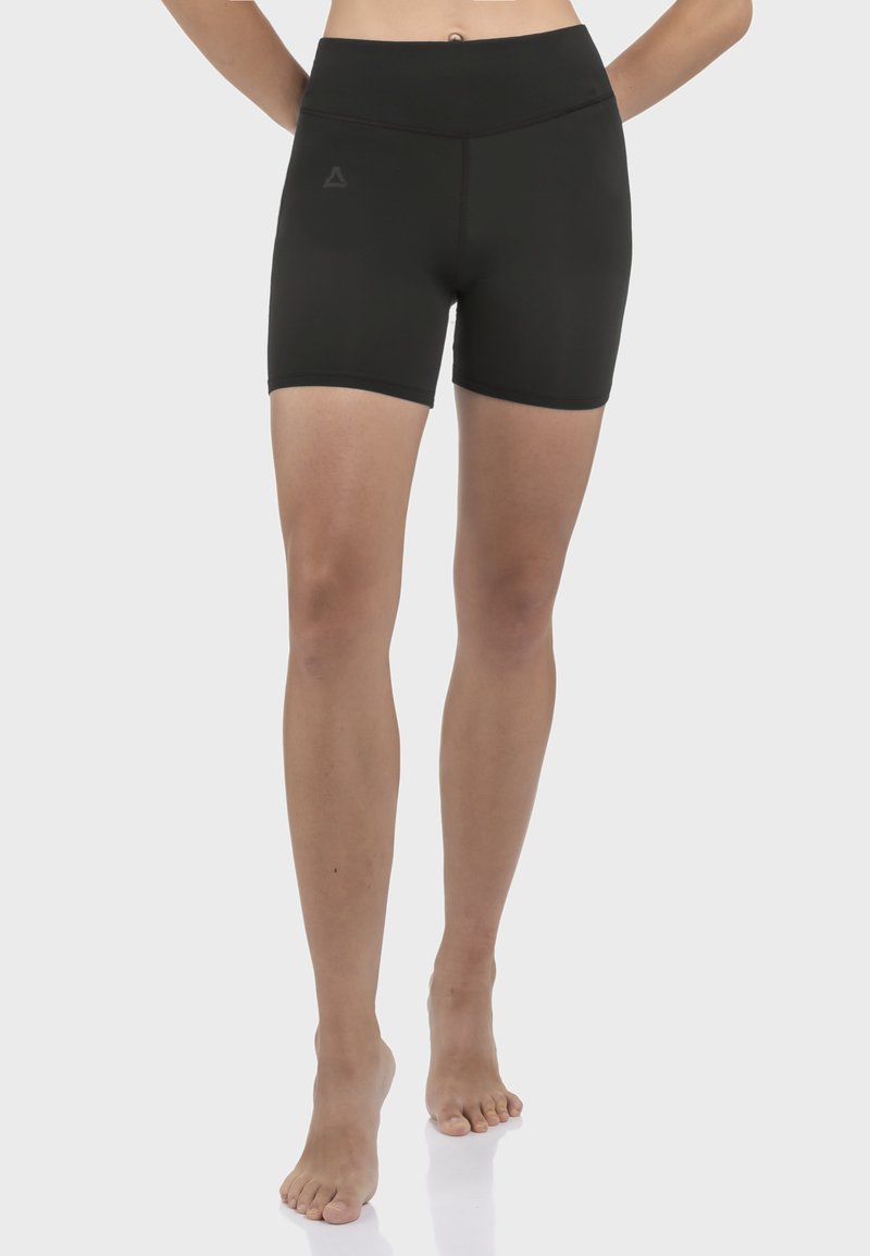 Schwarze Sportshorts aus elastischem Material, mit hohem Bund und einer eng anliegenden Passform, die bis zur Mitte des Oberschenkels reicht.