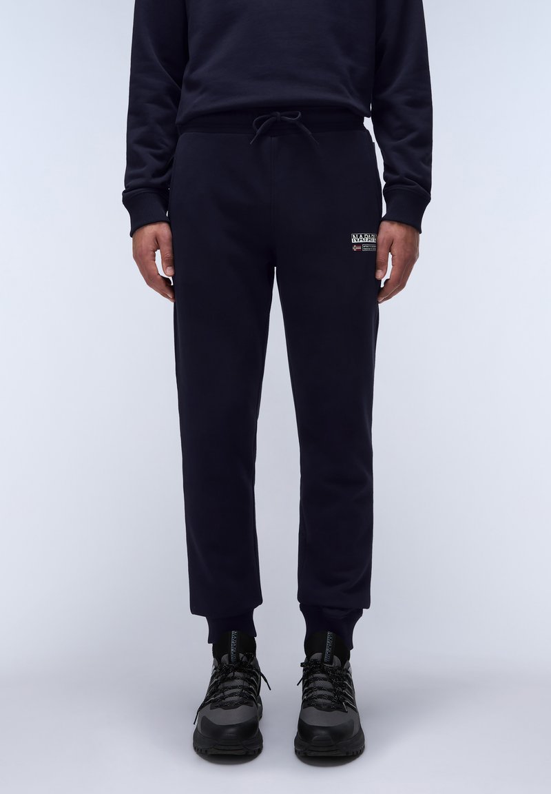 Navyblauwe sweatpants van zacht katoen met een elastische tailleband en een trekkoord, voorzien van een klein logo-opdruk op de linkerdij.