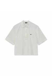 White cotton polo shirt with a collared neckline, short sleeves, and a pocket with a small embroidered logo on the left chest.