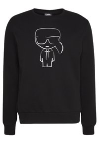 Czarna bluza bawełniana z białym nadrukiem stylizowanej postaci w okularach przeciwsłonecznych i garniturze, z okrągłym dekoltem i ściągaczami.