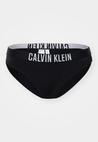 Crni bikini s glatkom teksturom tkanine. Ima široki elastični pojas s "CALVIN KLEIN" logotipom u bijeloj boji. Klasičan kroj gaćica.