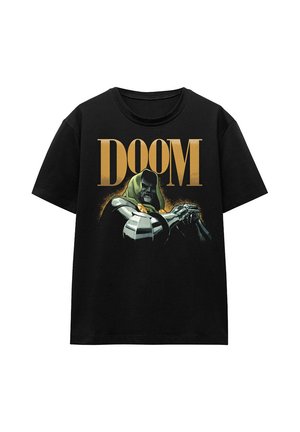 Black t-shirt with large gold text "DOOM" above an armored character wearing a green hood and metal gloves crossing arms.