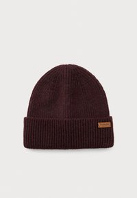 Tumed pruun soonikkoesega beanie, millel on volditud soon ja väike pruun silt, millel on kirjutatud "Barbour England" väänturse paremal küljel.