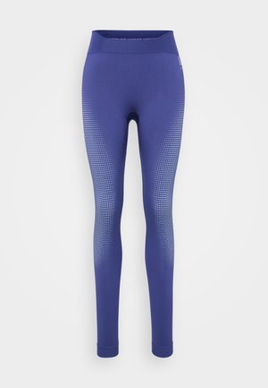 Leggings in donkerblauwe stof met een textuurgradatie patroon op de onderbenen en een brede, elastische hoge tailleband.