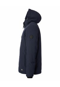 Marineblauer Winterjacke mit Kapuze, Reißverschluss und Knopfverschlüssen, Seitentaschen und einem runden schwarzen Patch am oberen Arm.