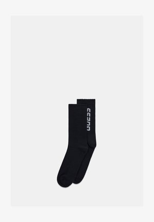 Guess, SOCKEN LOGOSTICKEREI - Chaussettes - schwarz
