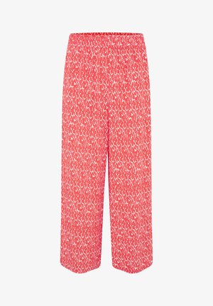 Punasekirdega kulotid lõdva lõikega, millel on veniv vöökoht ja tekstuuriga disain ebaühtlate valgete kujunditega.