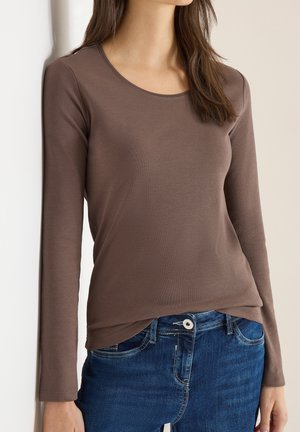 - Bluzka z długim rękawem