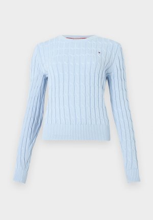 Light blue knitted sweater with a textured pattern, round neckline, and ribbed cuffs and hem. Features a small logo on the chest.