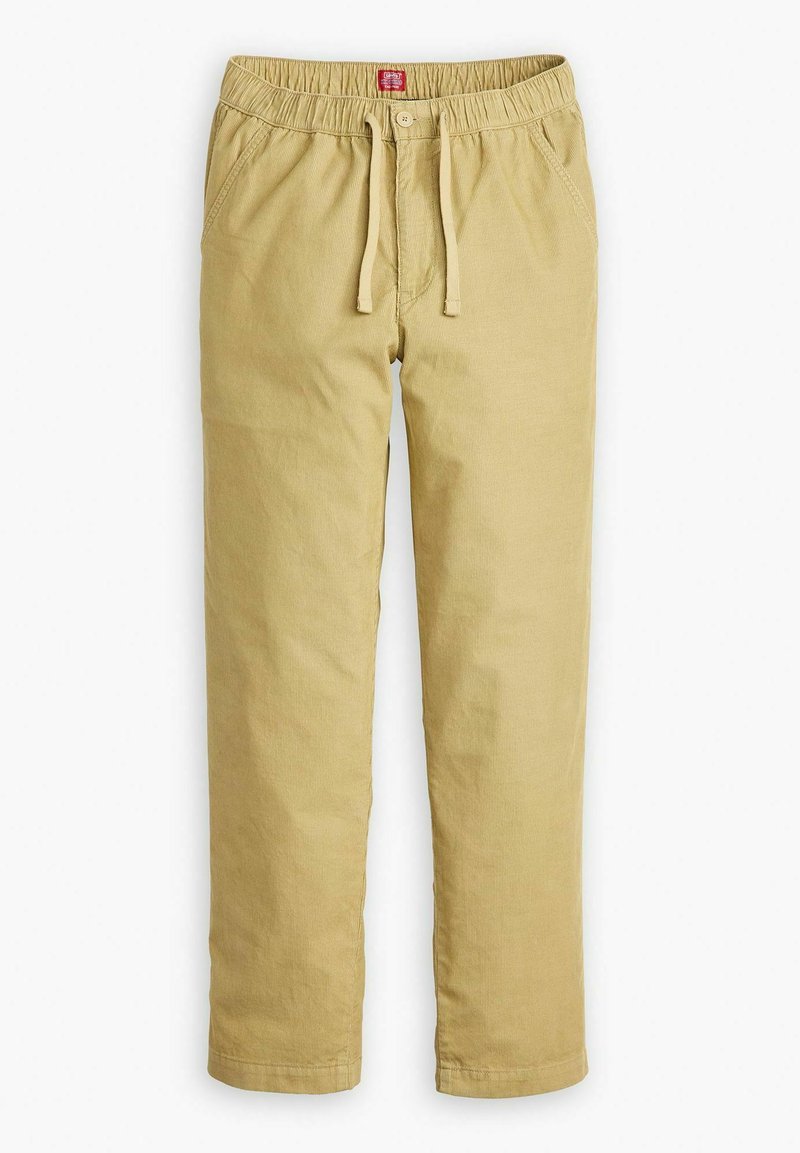 Pantalones de algodón marrón claro con cintura elástica y cordón. Cuentan con bolsillos laterales y un diseño de pierna recta. Textura suave.