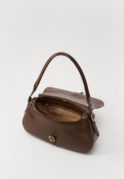 Brown leather handbag with a smooth texture, a single curved handle, a flap closure, and gold-tone hardware. Interior pocket visible.