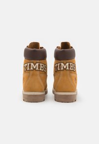 Timberland Botine cu șireturi - wheat/beige
