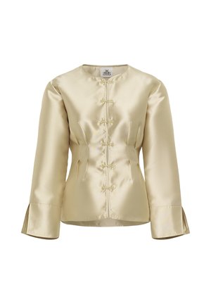 Satin-Bluse mit langen Ärmeln in hellem Gold, featuring einen runden Halsausschnitt, vordere Verschlüsse mit Knoten und ausgestellten Ärmeln mit geschlitzten Manschetten.