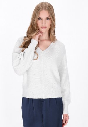 - Sweter