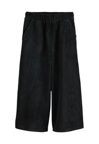 Crne manšete od korduroga s elastičnim pojasom, koje imaju dva bočna džepa i mekanu, teksturiranu površinu. Duljina doseže iznad koljena.